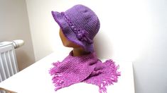 Beautiful hand crochet purple fedora / cloche / hat / beret / beanie / skullcap with lovely ruffle brim with variegated (melange) fringed scarf.  It is not original set, but items fit nicely together. Made of wool blend yarn. Hat is decorated with romantic rope flower and strap. Non itchy. Fits most adult and teen sizes -  stretchable. SIZE. The height of hat is 8.5'' (21.5 cm) brim including. Scarf is 9"(23 cm) wide and 70" (99 cm) long. Ready to ship.  Care: If needed, use delicate handwash wi Wide Brim Purple Winter Hat, Purple Wide Brim Winter Hat, Winter Purple Knitted Hat, Casual Hand Knitted Winter Cloche Hat, Hand Knitted Adjustable Cloche Hat For Winter, Adjustable Hand Knitted Cloche Hat For Winter, Adjustable Hand-knitted Winter Cloche Hat, Hand Knitted Purple Hat One Size, Hand Knitted Purple Hat