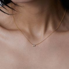 This elegant bezel pendant necklace features a 0.15ct diamond baguette on a delicate chain, made in 14k gold from Gilded by G.St. • 14k gold• 0.15ct baguette diamond• Chain length: 15-17" All G.St collections are made in NYC using recycled gold and responsibly sourced gemstones and diamonds curated by our Gemologists. Minimalist Diamond Necklace With Baguette Diamonds, Minimalist Yellow Gold Necklace With Baguette Diamonds, Minimalist Baguette Diamond Necklace, Minimalist 14k Gold Baguette Cut Necklace, Minimalist Baguette-cut Diamond Necklace For Anniversary, Minimalist Baguette Cut Diamond Necklace For Anniversary, Minimalist Gold Diamond Necklace With Baguette Cut, Minimalist White Gold Necklace With Baguette Diamonds, Gold Minimalist Baguette Cut Diamond Necklace