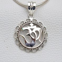 Metal-925 Sterling Silver This One of a kind Om Pendant Add this beautiful one little thing of galactic shine to make you feel unique and to transform your lives.Perfect for any kind of outfit and every occasion. About: 'OM' charms have their own significance. These jewelry pieces can be used for beautification and will also ensure financial as well as emotional satisfaction Wearing an 'OM' charm is said to bring harmony, peace and eternal bliss to the ones who wear them We accept custom and per Spiritual White Gold Pendant Jewelry, Silver Oval Pendant Charm Necklace In Sterling Silver, Silver Sterling Silver Oval Pendant Charm Necklaces, Adjustable Spiritual Round Pendant Jewelry, Silver Sterling Silver Charm Necklace With Oval Pendant, Spiritual Jewelry For Mother's Day, Adjustable Sterling Silver Jewelry With Large Pendant, Spiritual White Gold Jewelry With Large Pendant, Spiritual Pendant Jewelry For Mother's Day