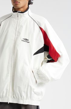 A sporty 3B logo and color-pop accents animate this technical poplin track jacket framed with piping-trimmed raglan sleeves. 30 1/2" length (size Large) Two-way front-zip closure Stand collar Elastic cuffs and hem Front zip-welt pockets Mesh lining 52% cotton, 48% polyamide Dry clean Made in Italy Designer Clothing Sports White Track Jacket With Contrast Panels, White Track Jacket With Contrast Panels For Sports, White Casual Track Jacket With Contrast Panels, Casual White Track Jacket With Contrast Panels, White Track Jacket With Contrast Panels, White Sporty Outerwear With Contrast Panels, Sporty White Outerwear With Contrast Panels, White Winter Track Jacket With Contrast Panels, Sporty Track Jacket With Logo For Streetwear