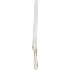 a white candle with a gold handle on a white background, in the shape of a cross