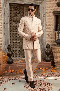 Peach bandhgala with geometric stitch line work on base, 3D tonal floral garden needle and French knots anchor threads embroidery. Comes with coordinated colored pant. - Aza Fashions Fitted Kurta With Chikankari Embroidery For Ceremony, Anchor Threads, Stitch Lines, Katan Silk, French Knots, Floral Garden, For Men, Silk, Floral