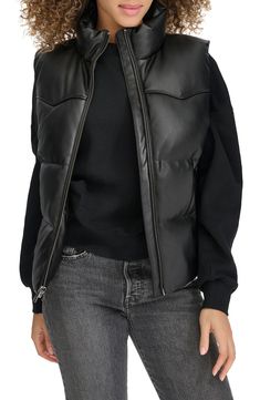 Give your ensemble a boost of edge and warmth with this faux-leather puffer vest that's water resistant for rainy-day looks. 23 1/2" length (size Medium) Front zip closure Stand collar Front welt pockets Water resistant Lined, with 100% polyester fill 100% polyester with polyurethane coating Machine wash, tumble dry Made in China Pants Shirt Men, Levis Women, Sneaker Dress Shoes, Puffer Vest, Edgy Look, Outdoor Apparel, Dress With Sneakers, Bold Fashion, Black Fits