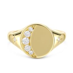 This yellow gold tone signet ring has an moon and star encrusted for extra sparkle. Five round brilliant white stones are set in sterling silver to form a perfect Crescent Moon. Just the right amount of glimmer. An out of this world design with lots of sparkling personality.Carat Weight: 0.605 ctStone Size: 1.5,2.2,2.5 mmStone Type: Jeulia® StoneNumber of Stones: 7 Stone Shape: RoundStone Color: Diamond WhiteWeight: 4.4 gWidth: 2.4 mmHeight: 3.35 mmThickness: 1.1 mmMaterial: 925 SilverPlating Co Gold Signet Ring With Diamond Accents, Gold Celestial Diamond Ring, Gold Round Signet Ring With Single Cut Diamonds, Celestial Style Polished Diamond Ring, Celestial Yellow Gold Round Cut Diamond Ring, Celestial Yellow Gold Diamond Ring With Round Cut, Celestial Yellow Gold Diamond Ring, Celestial Moon-shaped Diamond Rings, Gold Crescent Diamond Rings