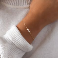 The perfect minimal pearl bracelet. Timeless, yet simple enough to wear everyday.  D E T A I L S: * Beautiful dainty chain * Freshwater pearls (approx 3mm)  * Hand-made in our happy little studio * Variety of lengths to choose from M A T E R I A L S: * All sourced from USA or Italy * 100% 14kt gold fill, rose gold fill, or sterling silver  * Comes in a cute little package ready for gifting HANDMADE WITH LOVE * All items are handmade with love in our happy Louisiana studio. * We use only highest White Minimalist Bracelets For Anniversary, Minimalist White Bracelets For Anniversary, Minimalist Pearl Chain Bracelet For Formal Occasions, Formal Minimalist Pearl Chain Bracelet, Adjustable Minimalist Pearl Chain Bracelet, Minimalist White Chain Bracelet For Formal Occasions, Minimalist Hypoallergenic Chain Bracelet For Wedding, Minimalist Pearl Bracelets As Gift, Minimalist Pearl Bracelets For Gifts