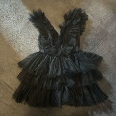 Brand New With Tags Sold Out Fashion Nova Dress. Black Tulle. Size Large. Never Worn Except To Try On! Send Offer! Black Spring Dress-up Dresses, Black Dress For Spring Dress-up, Chic Black Dress For Dress-up, Chic Ruffled Mini Dress For Costume Party, Black Ruffled Mini Dress For Costume Party, Black V-neck Dress For Costume Party, Dresses Fashion Nova, Black Tulle, Fashion Nova Dress