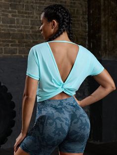 Solid Color Twist Open Back Cropped Sports T-Shirt Baby Blue   Short Sleeve Knitted Fabric Plain  High Stretch All Women Activewear, size features are:Bust: ,Length: ,Sleeve Length: Casual Blue Breathable T-shirt, Sporty Stretch V-neck Tops, Blue V-neck Athleisure Top, Sporty V-neck Yoga Tops, Sportswear T-shirt For Exercise, Spring Casual Yoga T-shirt, Spring Gym T-shirt With Stretch, Breathable Stretch V-neck Top, Casual Stretch Tops For Yoga