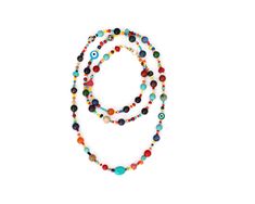 Multi color beaded long gemstone necklace. Made of rainbow colored glass seed beads and multi colored natural stones including turquoise, jade, dalmatian jasper, coral, onyx and agate gemstones. The necklace measures 36 inches in length and finished with a gold plated lobster claw clasp.  Details: - Multi-colored gemstones - Czech glass beads - Gold plated lobster claw clasp For additional information, please feel free to contact us. Colorful Natural Stone Beaded Necklaces With Round Beads, Multicolor Beaded Necklaces With Natural Stones For Jewelry Making, Colorful Beaded Necklaces With Natural Stones, Colorful Necklaces With Round Natural Stones, Colorful Gemstone Beaded Necklaces With Round Beads, Multicolor Gemstone Beads Beach Jewelry, Colorful Gemstone Beaded Necklaces, Multicolor Gemstone Beads Jewelry For Beach, Multicolor Round Gemstone Beaded Necklaces