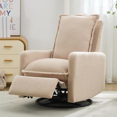 a beige recliner chair sitting on top of a white rug