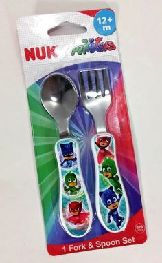 a fork and spoon set with cartoon characters on the forks, in a packaging for nuk