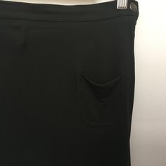 VIVIENNE WESTWOOD knee-length pencil skirt with side zipper and two front pockets that are largely ornamental. Made of 65% Acrylic and 35% Polyacrylic in a sturdy weave that clings to the body. Size: U.K. 14 / U.S. 10 Measurements: Waist: 37 cm / 14 1/2" (measured flat and not doubled) Hips: 45 cm / 17 1/2" (measured flat and not doubled) Length: 67 cm / 26 1/2" Condition: Excellent. Elegant Solid Mini Skirt With Pockets, Office Long Skirt With Pockets, Office Midi Skirt With Pockets, Pencil Skirt With Pockets For The Office, Elegant Pencil Skirt With Side Zipper, Knee-length Stretch Mini Skirt With Pockets, Solid Pencil Skirt With Pockets For Office, Solid Color Pencil Skirt With Pockets For Office, Office Pencil Skirt With Pockets