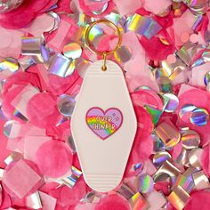 white keychain with purple heart and rainbow Funky Mirrors, Motel Keychain, Funny Keychain, Pink Border, Friends Laughing, College Gifts, Upgrade Your Look, Gifts Under 10, Bachelorette Gifts