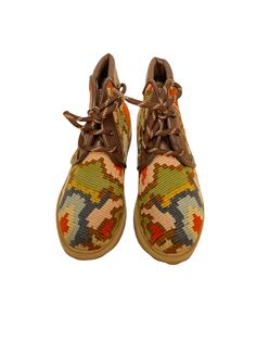 This kilim boots are very comfortable to wear as unisex!! Good quality kilim with leather... They make you gorgeous outfit. Much cushion to hold your ankles and have rubber sole to not to slip. We select beautiful old kilims from all over the Anatolia area and middle east area. and We do special wash for Kilim rug first, after that cut the kilim to remake unique kilim boots at our atelier one by one. All products have been produced in a smoke-free environment. Size : 38 Material : kilim / leathe Casual Brown Festival Boots, Casual Brown Boots For Festival, Handmade Casual Boots With Round Toe, Traditional Lace-up Boots With Rubber Sole, Multicolor Lace-up Boots For Outdoor, Multicolor Lace-up Boots With Rubber Sole, Kilim Flower, Shoes Vintage, Handmade Kilim Rugs Kilim.com