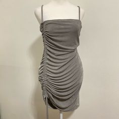 This Is The Perfect Combination Of Stretchy And Sexy For The Summer Time. The Form Flattering Fit Hugs Your Curves, While The Rushing Help To Hide Anything You Don’t Want To Put On Show. Nwt Sleeveless Metallic Ruched Mini Dress, Sleeveless Silver Mini Dress For Summer, Silver Sleeveless Mini Dress For Summer, Metallic Ruched Sleeveless Dress, Metallic Sleeveless Ruched Dress, Silver Mini Dress With Spaghetti Straps For Cocktail, Gray Sleeveless Mini Dress For Night Out, Metallic Sleeveless Mini Dress For Date Night, Silver Ruched Dresses For Party Season