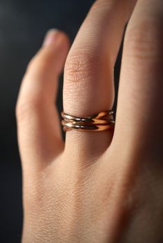 This item is hand-crafted and made to order in Portland, OR. This beautiful 14kt gold-fill wrapped ring will become a staple in your wardrobe. This Modern Twist Stackable Rings For Promise, Stackable Twisted Rings For Promise, Modern Twist Stackable Twisted Promise Rings, Modern Twist Infinity Stackable Rings, Criss Cross Ring, Woven Ring, Spiral Ring, Gold Rings Stackable, Wrap Ring