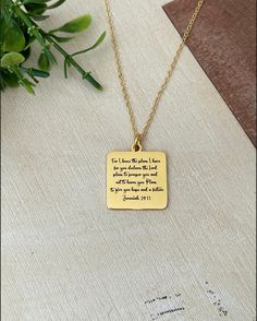 A beautiful dainty 18K gold plated necklace with a square gold pendant engraved with "For I know the plans that I have for you Jeremiah 29:11, Perfect Christian gift, Christian jewelry, baptism, faith necklace Charms are gold plated over stainless steel. Plated jewelry is a wonderful, affordable way to add a sophisticated look to your wardrobe, with the look of real gold. It is also an excellent choice for people with sensitive skin. CARE TIPS: Avoid contact with perfumes, body oils, and other chemicals, including household cleaners. Never use chemical jewelry cleaners as these will do more harm than good. For light cleaning, gently polish with a soft, lint-free cloth to avoid scratching. Store it in a cool dry place. ITEM DETAILS: 18 inch chain Laser engraved charm 18k gold over stainless Inspirational Personalized Rectangular Jewelry, Inspirational Rectangular Jewelry For Gifts, Inspirational Gold Charm Necklaces For Mother's Day, Inspirational Gold Charm Necklace For Mother's Day, Inspirational Gold Necklace For Personalized Gift, Gold Rectangular Pendant Jewelry As Gift For Mom, Gold Rectangular Pendant Jewelry For Mom, Gold Rectangular Pendant Jewelry Gift For Mom, Gold Rectangular Necklace For Mom