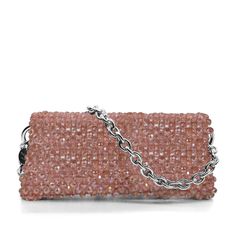 Introducing the Santorini shoulder bag, a stunning accessory that exudes elegance and sophistication. Handcrafted in Italy, this bag features a mesmerizing design adorned with crystals beads, adding a touch of sparkle to any ensemble. Made from high-quality crystal beads, it exudes an air of luxury. The unlined interior provides a minimalist aesthetic while offering ample space to fit your essentials. Material: Crystals beads Unlined Height: 10 cm Width: 24 cm Depth: 6 cm Complete with a 1-meter Luxury Pink Shoulder Bag For Evening, Luxury Beaded Clutch Shoulder Bag, Luxury Pink Evening Bag With Rhinestones, Luxury Clutch Shoulder Bag With Rhinestones, Luxury Rhinestone Clutch Shoulder Bag, Luxury Beaded Shoulder Bag For Events, Chic Beaded Evening Bag, Embellished Evening Shoulder Bag, Luxury Pink Rhinestone Evening Bag