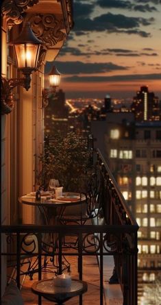 a balcony overlooking the city at night