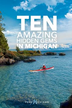 a person in a kayak on the water with text overlaying it that reads ten amazing hidden gems in michigan