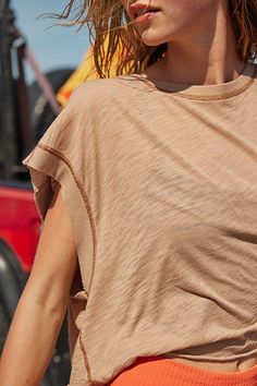 Make your next move in this light and airy layering tee featured in a slouchy design with a wrapped cutout back that’ll keep you cool through all your workouts. * Dropped sleeves * Wide neckline * Raw hemline | My Time Tee by FP Movement at Free People, Camel, M Summer Athleisure Tops For Layering, Summer Athleisure Muscle Tee With Crew Neck, Relaxed Summer T-shirt For Layering, Spring Athleisure Short Sleeve Muscle Tee, Spring Crew Neck Muscle Tee For Workout, Relaxed Summer Layering T-shirt, Sporty Tops For Summer Layering, Spring Workout Muscle Tee With Crew Neck, Summer Workout Muscle Tee With Relaxed Fit