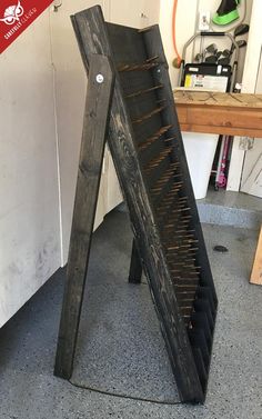 a large wooden object sitting on top of a floor