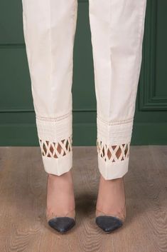 Beautiful pure cream cotton designer hand made lader trouser pant Full stitched product 🌺pair this trouser pant with crop top or tunic/shirt These loose fitting pant design is in trend right now 🌺This creates classic and elegant look that is easy to wear and will get noticed for sure 🌺Front belt Back elastic Flexible sizes Quality stitching NOTE: There might be slightly colour variation due to light and resolution and different colour settings. 🌺Please send me a message if you have any quest Summer Cotton Pants With Chikankari Embroidery, Elegant Cotton Pant Set With Chikankari Embroidery, Fitted Cotton Sets With Straight Pants, Elegant Festive Cotton Pants, White Cotton Pant Set For Eid, Cotton Bottoms With Chikankari Embroidery For Spring, White Cotton Pants For Eid, Cotton Straight Pant Set For Summer, Spring Cotton Pants With Chikankari Embroidery