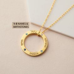 "This beautiful eternal circle necklace represents the bond between mom & children, grandma and her grandkids. It's a perfect gift for your loved one with up to 5 names. PRODUCT INFO * Material: Solid 925 Sterling Silver * Dimensions: Pendant measures ~7/8\" (23mm) in diameter * Word limits: 5 names/charm * By default, silver charm comes with BLACK engraving and gold-plated charm comes with CLEAR engraving * You can use birthstones for this necklace HOW TO ORDER * Select your preferred finis Mother's Day Birthstone Necklace Gift, Mother's Day Round Birthstone Necklace Gift, Round Birthstone Necklace For Mother's Day Gift, Mother's Day Gift: Round Birthstone Necklace, Birthstone Jewelry For Father's Day Birthday Gift, Birthstone Necklace For Birthday Gift, Yellow Gold Birthstone Necklace For Birthday And Mother's Day, Personalized Yellow Gold Birthstone Necklace For Mother's Day, Mother's Day Yellow Gold Birthstone Necklace For Birthday