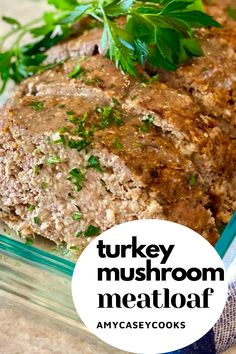 turkey mushroom meatloaf in a glass dish with parsley garnish on top