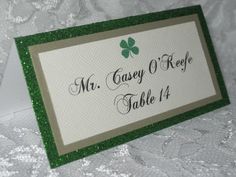 a place card with a shamrock on it