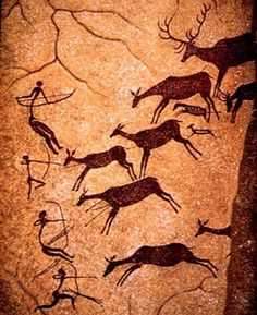 an image of deers and antelope in the rock art at cave city