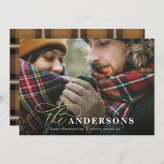 a christmas card with a photo of two people holding each other and the words, the andersons