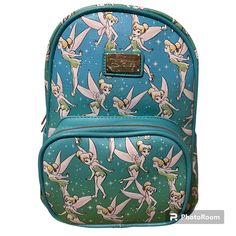 Storybook Disney Tinker Bell Ombre Mini Backpack You're Going To Love This Disney Mini Backpack Featuring Disney Tinker Bell! Stylish And Sleek Mini Backpack Made From Premium Vegan Leather. It Measures 12" X 6" 9.5" Inches And Features Space To Carry All Your Favorite Things Including Phone, Wallet, Keys, Etc. The Gorgeous Artwork Is Applied Using The Latest Printing Technology So It Will Hold Up Well Over Time. Officially Licensed Product Dimensions: Width 9.5" Depth 6" (7" With Pocket) Height Disney Backpack With Case For School, Disney Backpack For School With Case Included, Disney Backpack With Zipper Closure For Daily Use, Daily Use Disney Backpack, Blue Disney Backpack With Zipper Closure, Disney Mini Backpack, Disney World Backpack, Backpack With Pins, Loungefly Purse