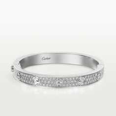 Cartier - LOVE bracelet - Bracelet Woman White gold - LOVE bracelet, 18K white gold (750/1000), set with 204 brilliant-cut diamonds totaling 1.99 carats. Width: 6.7 mm. Thickness: 3 mm (for size 17). Please note that the carat weight, number of stones and product dimensions will vary based on the size of the creation you order. For detailed information please contact us. Silver Cartier Bracelet, Cartier Love Bracelet Diamond, Cartier Earrings, Pave Bracelet, Bracelet Love, Bracelets Gold Diamond, Love Bracelet, Cartier Love, Bracelet Collection