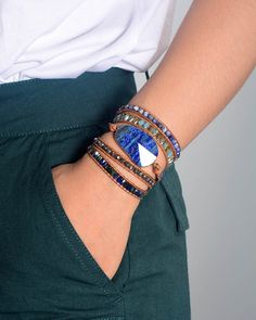 Are you looking for a unique Bohemian style connected to Nature? you should try our "Oceana Lapis Lazuli Stone Wrap Bracelet" Material : Lapis, Sodalite, Crystal, Alloy, Leather Making Technics : Full Handmade Size : Around 32.5 inches and 3 extra closures for adjustment Product condition : 100% New & TOP 1 Quality Guarantee Custom Service : Accept, please contact us for a special size before you place an order. Keywords : Unique Bracelet Boho Bracelet Natural Stones Beads Bracelet, Wrap Bra Peace Bracelet, Balance Bracelet, Treasure Jewelry, Healing Gemstone Bracelets, Lapis Lazuli Crystal, Lapis Lazuli Bracelet, Lapis Lazuli Beads, Stone Wrapping, Beaded Wrap Bracelets