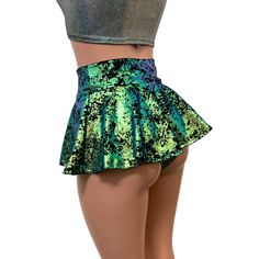 10" Super Mini Rave Skirt High Waisted Metallic Green on Black Gilded Velvet Handmade in the USA Stretch green on black gilded velvet high-waisted skater rave skirt. The shimmery fabric shines in the light and swings and twirls with movement. The skirt length is 10" from top to bottom - but if you'd like it shorter, please specify in the personalization box. Shown in photos with our high waist scrunch bikini in gleaming silver - sold separately in our shop. Dinosaur Rave Outfit, Rave Skirt Outfit, Hologram Skirt, Rave Outfits Skirts, Skater Skirt Outfit, Velvet Skater Skirt, Velvet Clothing, Genie Script, Rave Skirt