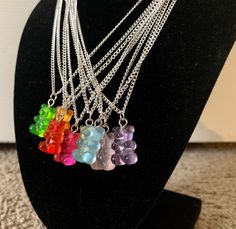 Show your love for sweet treats with these cute gummy bear necklaces and earrings in a bright array of rainbow colors!  Each necklace is stunning with a colorful acrylic gummy bear charm on a 18 inch shiny stainless steel chain with lobster clasp. The dangle earrings have the same charms attached to stainless steel french style ear wires. Each bear charm is looks just like the real thing and is sized the same, 2 cm in length and 1 cm wide. Choose your piece and your color, make it matchy or mix Gummy Bears Jewelry, Resin Dangle Jewelry For Birthday, Birthday Resin Dangle Jewelry, Sweet Green Jewelry For Gifts, Novelty Resin Jewelry For Birthdays, Cute Multicolor Sterling Silver Jewelry, Cute Resin Jewelry For Birthdays, Cute Resin Jewelry For Birthday, King Baby Jewelry