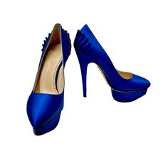 Charlotte Olympia Women's Paloma Blue Silk Satin Platform Pumps With Box Features Include Classic Almond Toe Sits Atop 1 1/4" Silk Covered Island Platform. 5 3/4" Covered Heel; 4 1/2" Equivalent. "Dolly" Is Made In Italy. 100% Authentic/See Tags Attached. Comes With Matching Tights. Size Us: 5.5 / Size Eu: 36 New Retail: $975.00 Hassle-Free No Cost Returns Shop With Confidence Trusted Seller, Selling Fashion For Over 25 Years Elegant Blue Wedding Shoes For Evening, Elegant Blue Pointed Toe Wedding Shoes, Chic Blue Heels For Gala, Chic Blue Wedding Shoes For Evening, Blue Fitted Heels For Gala, Elegant Royal Blue High Heels, Elegant Blue High Heels, Elegant Royal Blue Evening Heels, Luxury Blue Heels For Galas