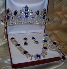 Deauville Set   Crowndesigners has created a timeless, elegant, regal "set", that includes:   Tiara Necklace Earrings Brooch   The set is mounted on silver tone metal, with clear crystals, enhanced with blue stones, simulating sapphires. The design is based in the style of 18th century European jewelry, popular with qu Royal Crown Jewels, European Jewelry, Diamond Tiara, Rhinestone Fashion, Rhinestone Crown, Diamond Jewelry Designs, Royal Jewels, Royal Jewelry, Crown Jewels