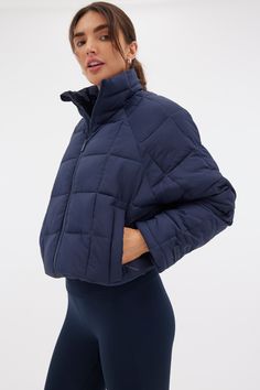 Our lightweight quilted puffer that packs into a travel pillow, designed for every outdoor adventure. Sporty Quilted Puffer Jacket For Outdoor Activities, Sporty Quilted Puffer Jacket For Cold Weather, Sporty Recycled Polyester Puffer Jacket For Outdoor Activities, Winter Packable Puffer Jacket For Outdoor Activities, Travel Nylon Puffer Jacket, Quilted Nylon Puffer Jacket For Travel, Sporty Quilted Nylon Puffer Jacket, Outdoor Puffer Jacket In Recycled Polyester, Sporty Quilted Outerwear For Outdoor Activities