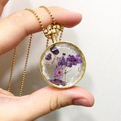 Fresh Pressed dried real Flowers, simple Vintage Long Chain Crystal Round Pendant Necklace jewelry, Unique resin glass vial locket products great gifts for her or your best girlfriend. comes with chain. These handmade floral charms are faceted to give a crystal look. for more awesome beautiful nature jewellery go to Nuroco.com Worldwide shipping available #nuroco Spiritual Pendant Jewelry With Pressed Flowers, Nature-inspired Jewelry With Adjustable Chain As Gift, Spiritual Style Necklace With Pressed Flowers As A Gift, Spiritual Necklaces With Pressed Flowers As Gift, Bohemian Jewelry With Pressed Flowers In Resin, Nature-inspired Metal Jewelry For Gifting, Metal Necklace With Flower Charm For Gift, Nature-inspired Metal Jewelry For Gift, Nature-inspired Metal Jewelry For Gifts