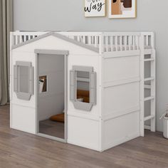 a child's bedroom with a white loft bed