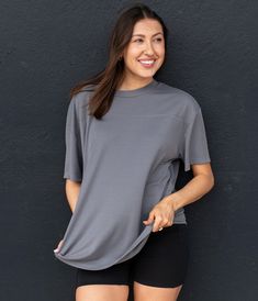 The perfect basic tee for casual everyday comfort with an oversized fit. Also pairs great with our lounge collection for mix-and-match styling. Shannon is 5’10” and is wearing a small. Versatile Oversized T-shirt For Everyday, Versatile T-shirt With Shirttail Hem, Versatile Oversized T-shirt, Athleisure Boxy Fit T-shirt For Loungewear, Sporty Boxy Fit T-shirt For Loungewear, Sporty Boxy Fit T-shirt For Everyday, Soft-washed Relaxed Fit T-shirt For Athleisure, Effortless Oversized T-shirt For Layering, Gray Relaxed Fit Top