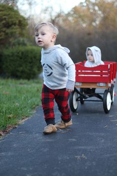 These cute flannel pants are great winter and fall pants for babies and toddlers. They are made from super soft flannel and jersey knit cuffs. All seams are serged for added durability. The waistband is made from soft, braided elastic for excellent comfort. The pants are cut larger than Cotton Pants For Playtime In Fall, Cute Fall Bottoms For Playtime, Cute Fall Playtime Bottoms, Cotton Pants For Winter Playtime, Playful Bottoms For Playtime In Winter, Flannel Boy, Baby Boy Pants, Buffalo Plaid Flannel, Plaid Baby