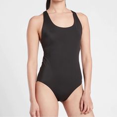 Nwt Athleta Malibu One Piece Swimsuit In Black For: Swim, Surf, Stand-Up Paddle-Board, And All Water Sports Feel: Recycled Swim Fabric Is Smooth And Sleek With Powerful Stretch Fave: Racerback Design For Full Range Of Motion Compressive Fabric With Shelf Bra For Added Support Recycled Nylon/Spandex Quick-Drying: Dries In A Flash Rated Upf 50+ (Excellent Protection) Abrasion-Resistant: Resists Snags And Tears Sustainable: Made With Recycled Nylon, A High-Performance Material That Helps Lessen Our Sporty Black Sleeveless Leotard, Casual Racerback Sports Bodysuit, Sporty Sleeveless Leotard For Sports, Casual Sports Racerback Bodysuit, Solid One-piece Leotard For Sports, Solid One-piece Sports Leotard, Stretch One-piece Sports Leotard, One-piece Athleisure Bodysuit For Workout, Racerback Bodysuit For Sports