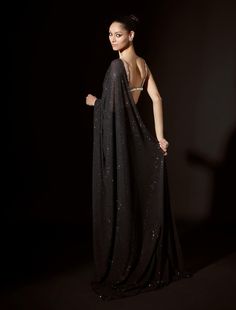 Black crystal-embellished pre-stitched sari paired with a silver blouse featuring striking big stones. Silver Blouse, Drape Saree, Black Saree, Indian Dress, Blouse For Women, Wedding Outfits, Stone Work, Saree With Blouse, Black Crystals