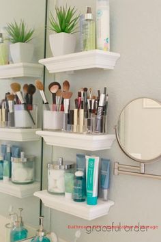 the bathroom shelves are filled with makeup and toiletries