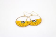 Yellow hand beaded modern semi circle beaded earrings, lightweight beautiful accent for cold winner or bright summer or day.  These circle earrings measure 3.8 cm They hang approx. 1 1/2 inch of the ear, from a 18 K gold plated ear wire Circle Beaded Earrings, Earrings Big, Earrings Summer, Dangle Hoop Earrings, Summer Earrings, Disc Earrings, Yellow Earrings, Summer Earring, Half Circle