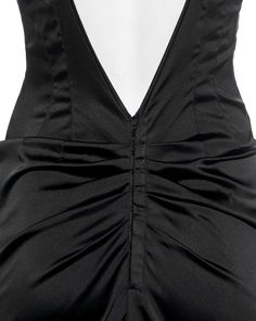 For Sale on 1stDibs - ▪ Dolce & Gabbana black evening dress ▪ Stretch satin ▪ Attached bra with adjustable shoulder straps ▪ Low back ▪ Ruched center-back seam with corset style Elegant Backless Slip Dress With Ruched Bodice, Black Strapless Evening Dress With Ruched Bodice, Black Satin Dresses With Boning, Evening Ruched Satin Backless Dress, Party Dress With Ruched And Closed Back, Evening Fitted Bodice Backless Dress, Fitted Bodice Backless Evening Dress, Black Satin Evening Dress With Spaghetti Straps, Low Back Evening Dresses With Boning