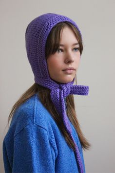 Say hi to a new product at our shop: knitted bonnet. At the moment, the most trend-driven style is the bonnet, a modern version of the headgear popular among Puritans in the 17th century, and its very close relation, the knitted hood, a crafty version of a balaclava without the face covering. Bonnets are a perfect beanie and balaclava hybrid. Great hat alternative that ought to be on your radar. Made from 70% merino wool and 30% microfiber. Handmade with love. in the personalization line, indica Knitted Bonnet, Bonnet Hat, Knitted Hood, Face Covering, Turbans, Face Coverings, Winter 2024, Style Expert, Hair Accessories Headbands