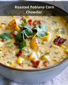 a white bowl filled with corn chowder and garnished with cilantro